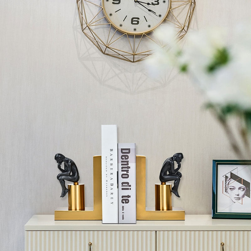 Porta livro O Pensandor - em metal